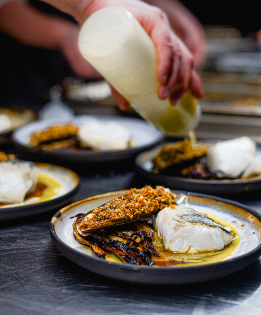 Valentine's roasted cod with parsley sauce, shellfish sauce, fennel and razor clams